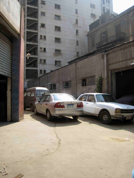 <a class="fancybox" rel="gallery-" href="https://www.cuipcairo.org/sites/default/files/styles/largest/public/d19_01.jpg?itok=EZrkrXDu" title="Cairo Motor Company engulfes the passageway">Enlarge</a><br >2015, Oct 18, 04:10am<br>Cairo Motor Company engulfes the passageway