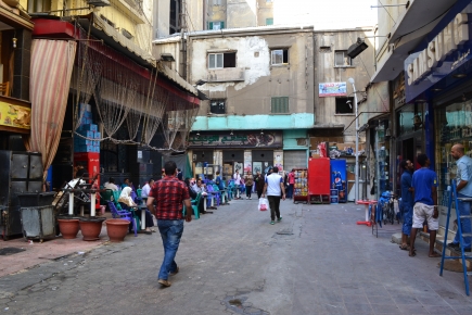 <a class="fancybox" rel="gallery-" href="https://www.cuipcairo.org/sites/default/files/styles/largest/public/dsc_0436.jpg?itok=_RIb1vmS" title="Overview of the passageway with Funoon coffeehouse on the left.">Enlarge</a><br >2015, Sep 29, 02:09pm<br>Overview of the passageway with Funoon coffeehouse on the left.